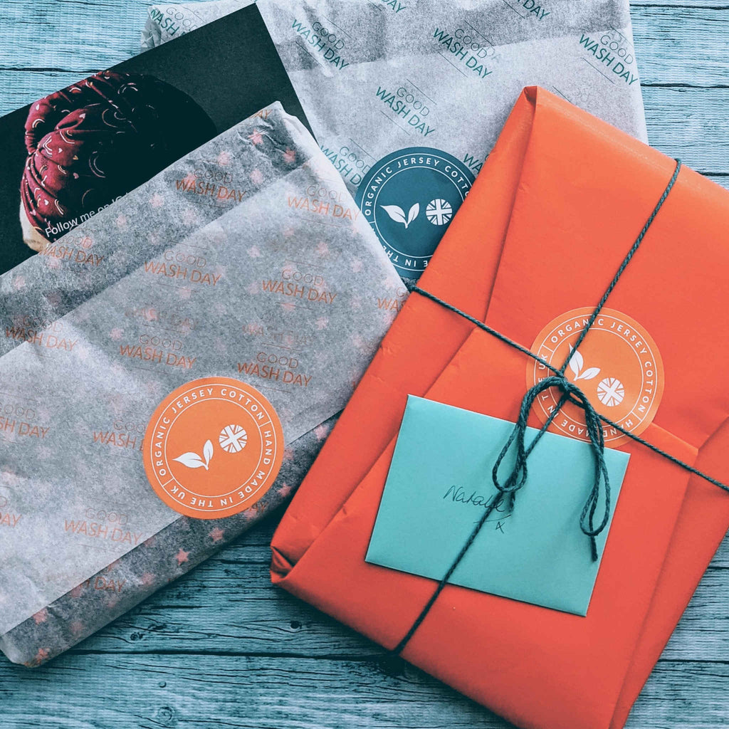 Gift wrapping for hair towels in eco friendly recyclable packaging. T-shirt towels are organic jersey cotton.
