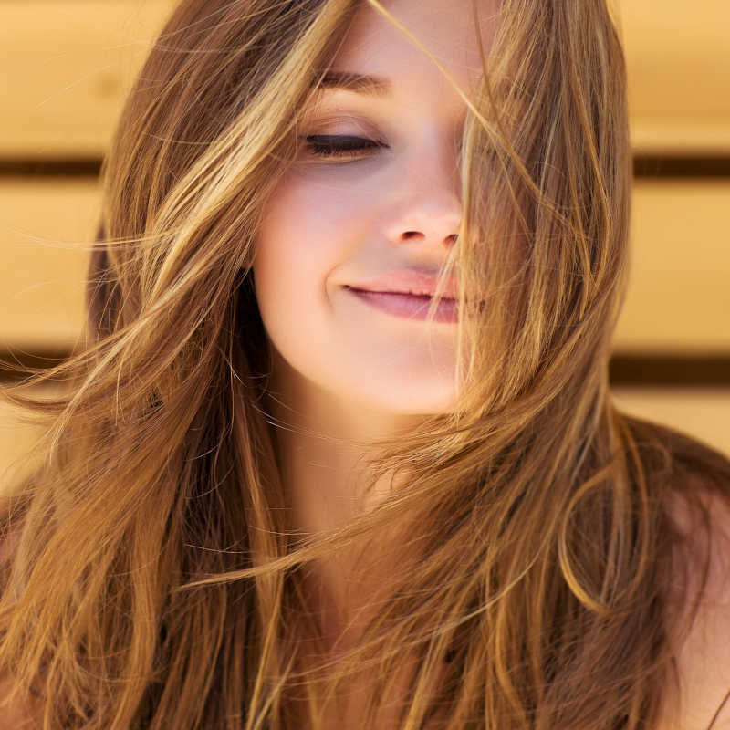 Strong healthy straight hair.