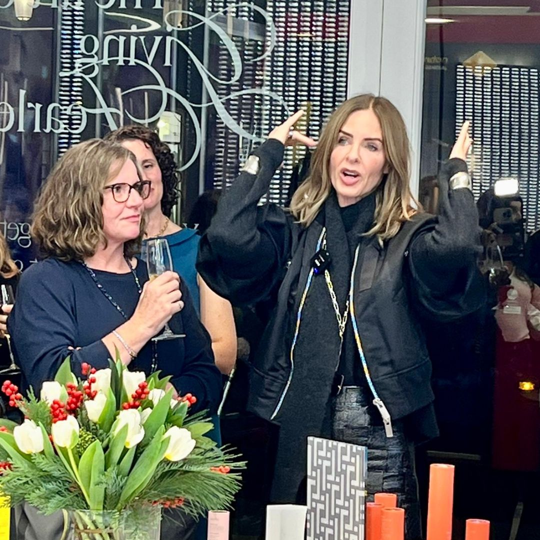 Carla and Trinny Woodall in the Trinny London Chelsea flagship store discussing Good Wash Day hair towels