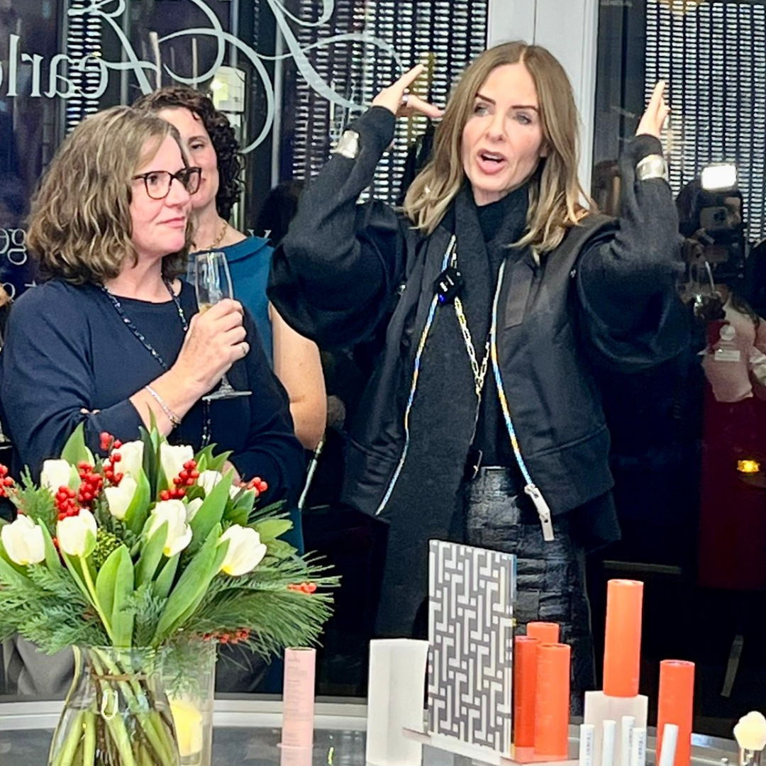 Carla and Trinny Woodall in the Trinny London Chelsea flagship store discussing Good Wash Day hair towels