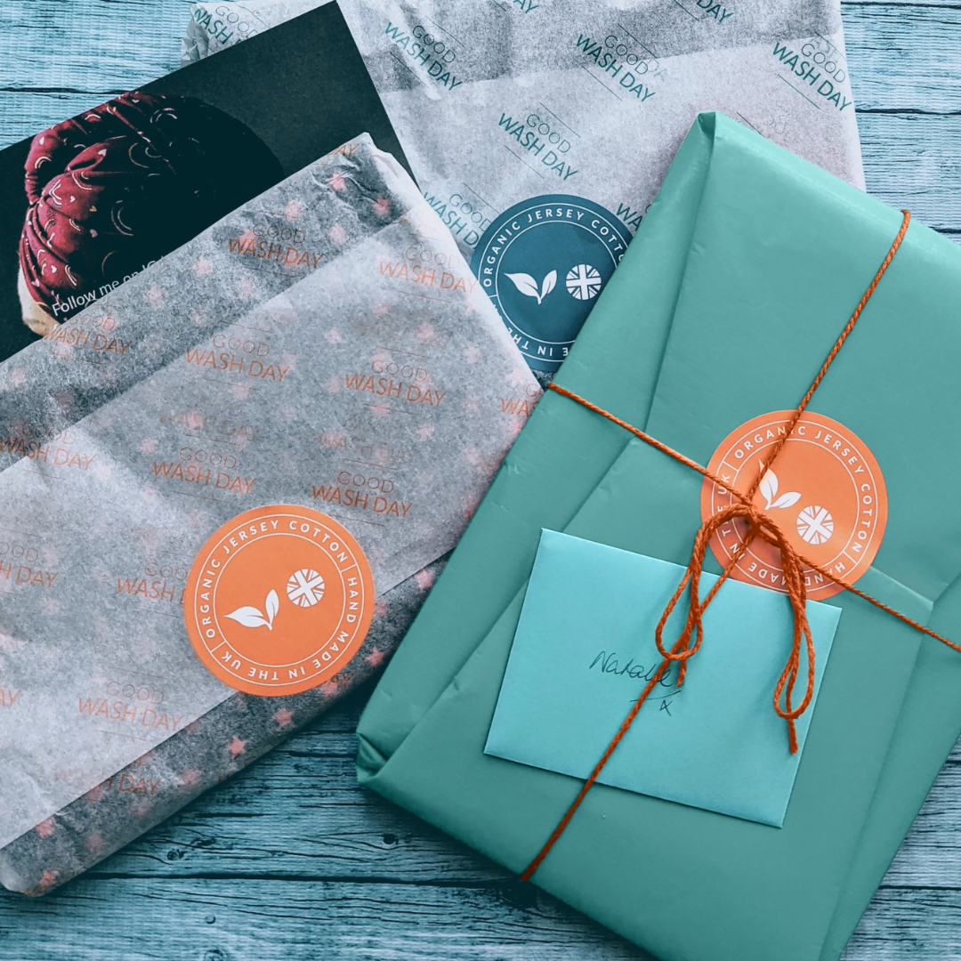 Teal Good Wash Day eco-conscious gift wrap with branded sticker