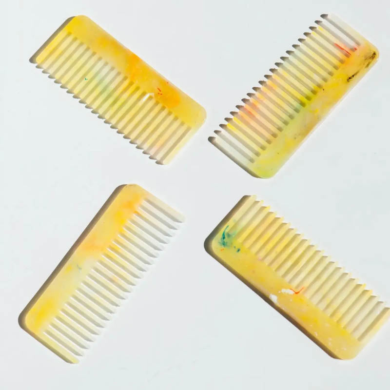 Recycled plastic wide-tooth hair comb in yellow by Mull Club