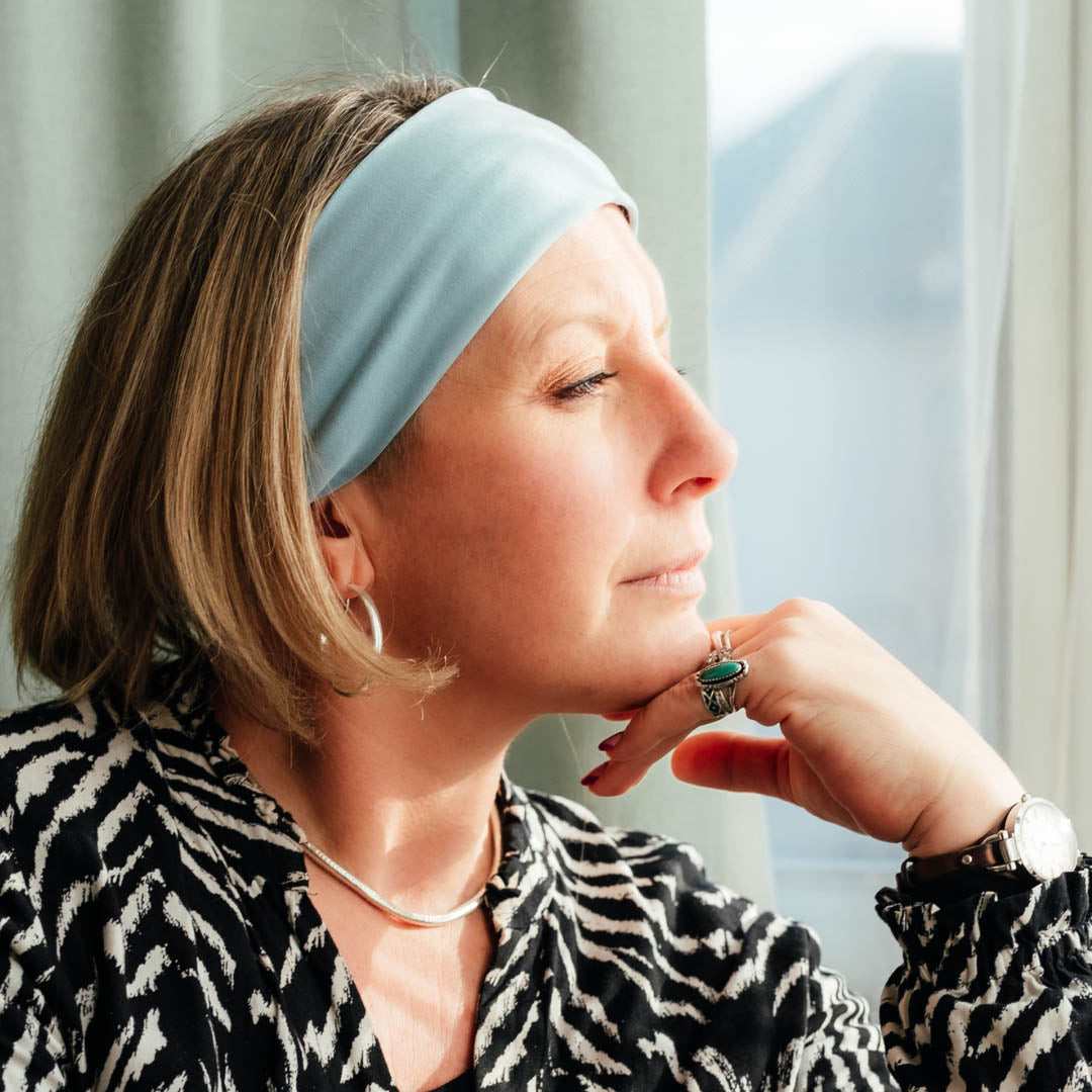 Woman wearing pastel blue jersey cotton headband – Good Wash Day