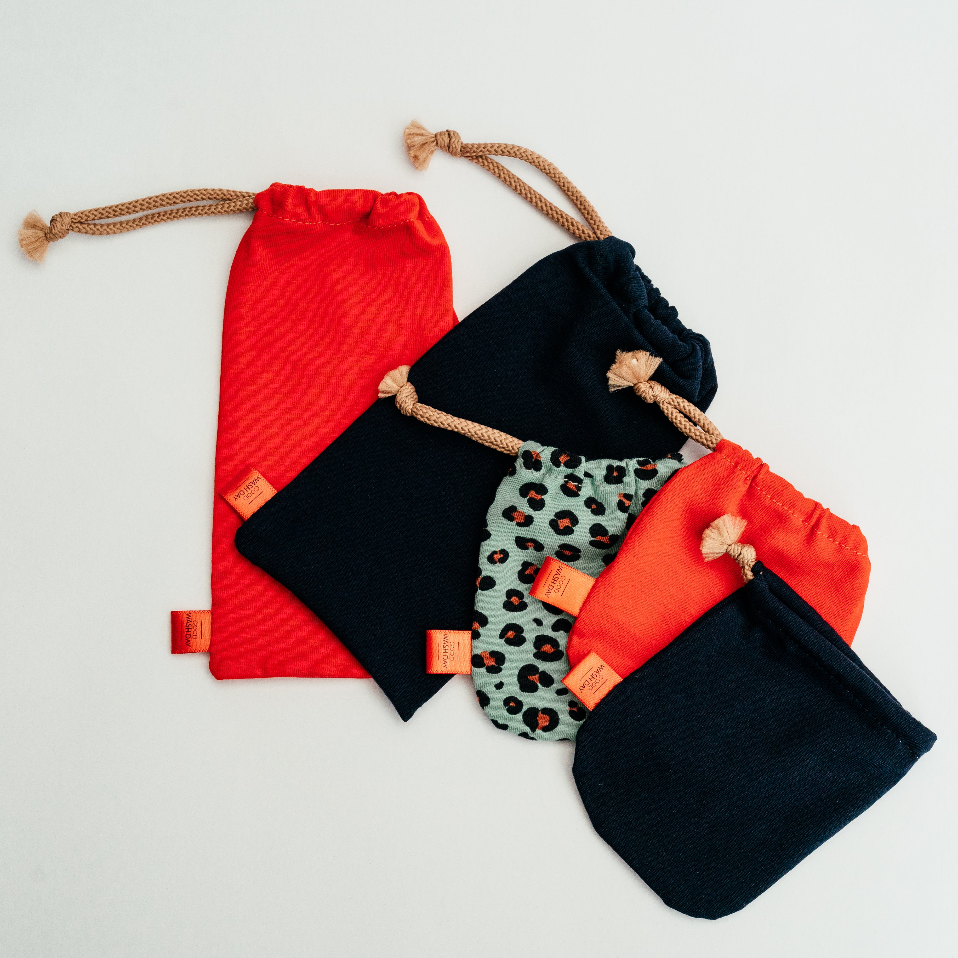 Organic jersey cotton drawstring bags in mixed sizes