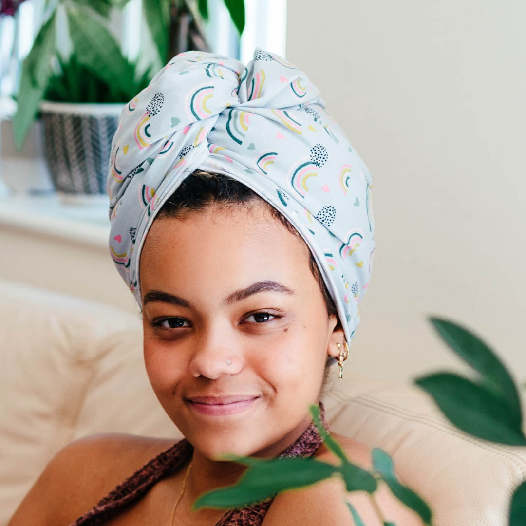 Woman wearing reduced price blue grey rainbows organic jersey cotton hair towel wrap | Good Wash Day