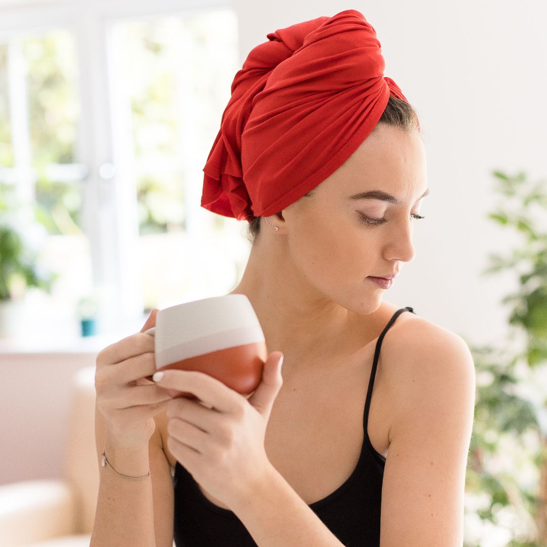Teenager wearing a bright red organic jersey cotton hair towel wrap - Good Wash Day