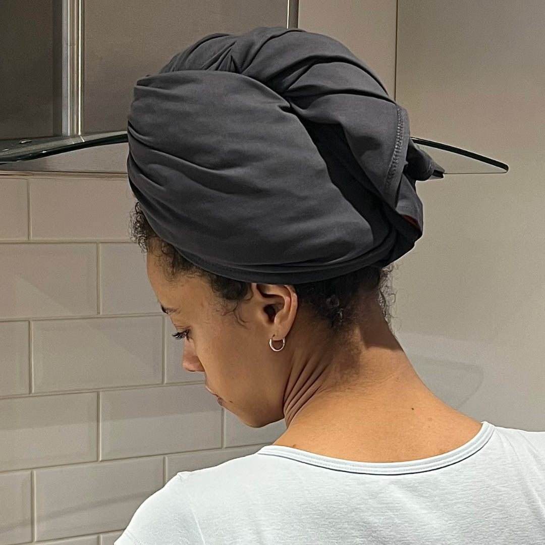 Woman with afro hair wearing grey XL organic jersey cotton hair towel wrap for very long hair – Good Wash Day