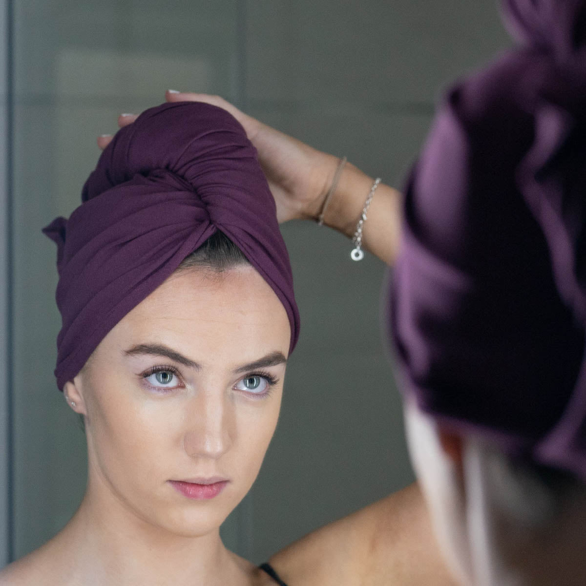 Younger woman wearing plum coloured organic jersey cotton hair towel wrap – Good Wash Day