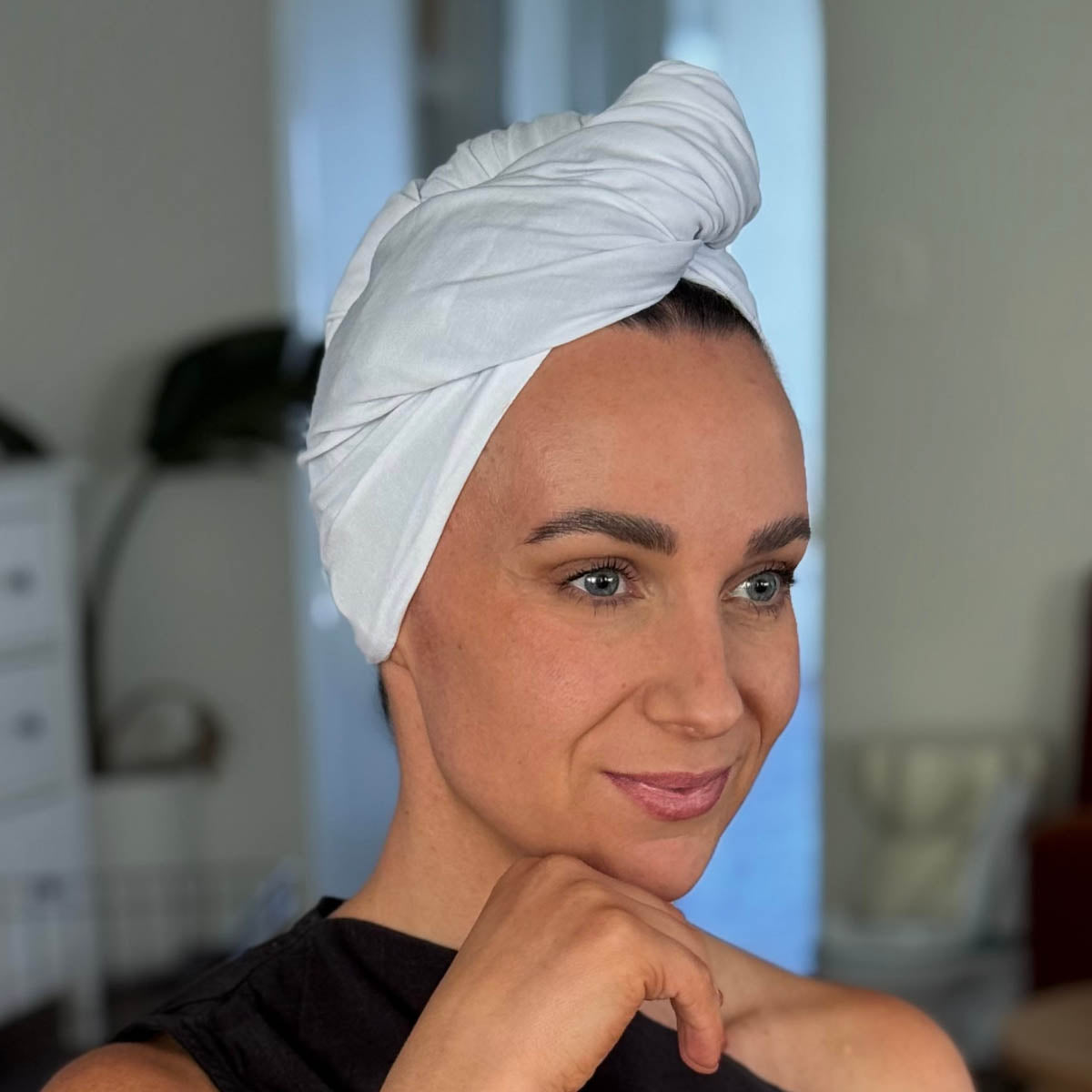 Woman wearing white organic jersey cotton hair towel wrap – Good Wash Day