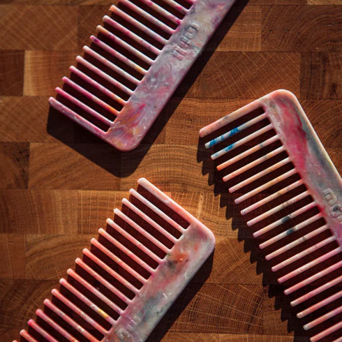 Recycled plastic wide-tooth hair comb in pink by Mull Club